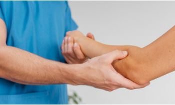 side-view-male-osteopathic-therapist-checking-female-patient-s-elbow-joint-movement